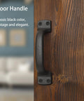 Black Cast Iron Barn Door Handles Rustic Heavy Duty Gate Pulls 7 Inch Sliding Door Hardware on wood surface