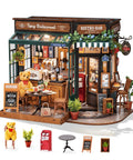 One Eighteen Scale Coffee Bar Dollhouse Kit With Led Lights Diorama Miniature House Building Kit For Adults Tipsy Restaurant Scene Diy Craft Gift For Him Or Her Cozy European Bistro Vibe, featuring a detailed bistro setting with plants and decor.