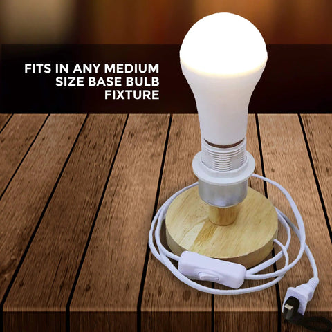 LED Smart Emergency Light Bulb With Rechargeable Battery Backup For 3 To 4 Hour Power Outages Perfect For Camping And Outdoor Use Handy Hook Four Pack on wooden base