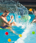 60-Piece Reusable Water Balloons Set With Soft Splash Balls For Outdoor Water Games in pool, people enjoying summer fun.