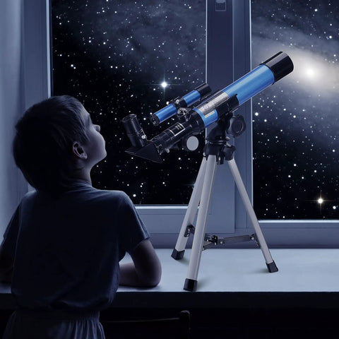 Portable Telescope For Kids And Astronomy Beginners 40 By 400 With Tabletop Tripod And Two Eyepieces Finderscope Compass Space Gift For Stargazing For Night Sky Observation on a tabletop with child