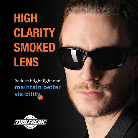 Person wearing Spoggles All-In-One Protective Eyewear with smoke lens, featuring high clarity and UV impact resistance.