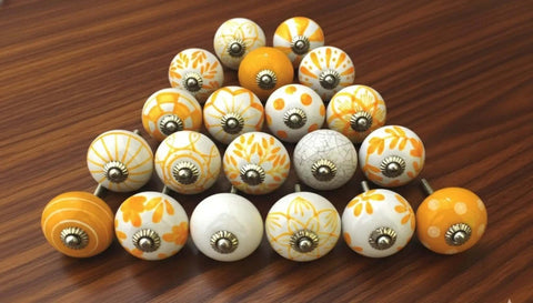 Fresh Yellow Floral Ceramic Knobs Kick Up Your Kitchen And Bedroom Cabinet Game With This Slick Set Of 20 Round Decorative Drawer Pulls Featuring A Glossy Finish For Total Home Refresh Vibes, showing assorted decorative knobs.