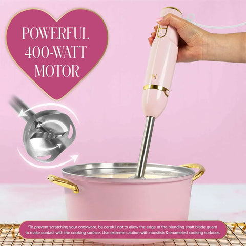 Chic Pink And Gold 3 In 1 Immersion Blender With Whisk And Chopping Bowl 400W High Speed Handheld Mixer in use with soup pot.
