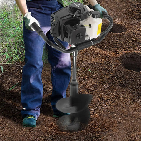 Man using Beast 72cc Gas Powered Post Hole Digger With 4.1HP Heavy Duty Earth Auger on soil
