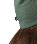 Close-up of the Unisex Merino Wool Beanie With LIFA Technology, Jungle Green, One Size, showing the detailed fabric texture.