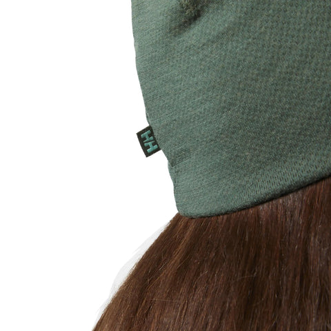 Close-up of the Unisex Merino Wool Beanie With LIFA Technology, Jungle Green, One Size, showing the detailed fabric texture.