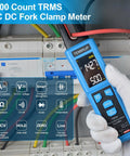Digital Clamp Meter With U Shaped Jaw For AC And DC Current And Voltage Auto Range 4000 Counts in use measuring wires