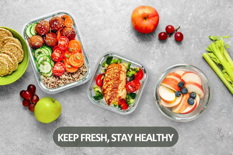 Glass Food Storage Set With 24 Pieces And Upgraded Snap Lock Lids For Meal Prep, Airtight Containers scattered with food