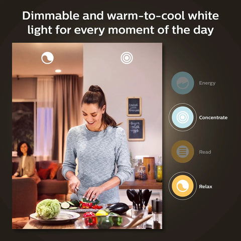 Woman using White Ambiance 60W LED Smart Light Starter Kit With Hub And Smart Button Two Pack Featuring Four A19 Bulbs Per Kit