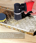 Heavy Duty Pneumatic Die Grinder Pulling Serious Power At 15000 Rpm with muffler on zinc alloy textured metal surface.