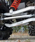 Heavy Duty Aluminum Rear Radius Arms For Can Am Maverick DPS X MR X RS Max 2013 And Up Hex Design For Strength To Weight Ratio Polished Finish Easy Fitment Upgrade For Rugged Off Road Adventures. underside view on UTV with polished aluminum rear arms