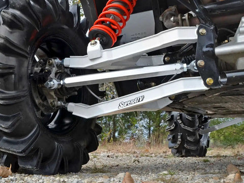 Heavy Duty Aluminum Rear Radius Arms For Can Am Maverick DPS X MR X RS Max 2013 And Up Hex Design For Strength To Weight Ratio Polished Finish Easy Fitment Upgrade For Rugged Off Road Adventures. underside view on UTV with polished aluminum rear arms