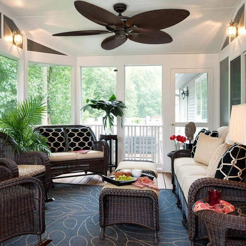 Palm Island 52 Inch Tropical Ceiling Fan With No Light for Indoor Outdoor Use in a cozy patio, featuring 5 palm leaf blades.