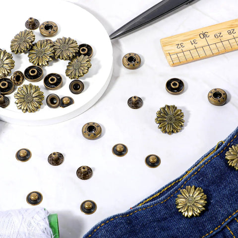 10 Sets Vintage Flower Snap Buttons For Leather And Fabric Metal Zinc Alloy Button Fasteners Dope Flower Craft Snaps For Clothes DIY Sewing Projects And Decor shown with sewing tools and denim
