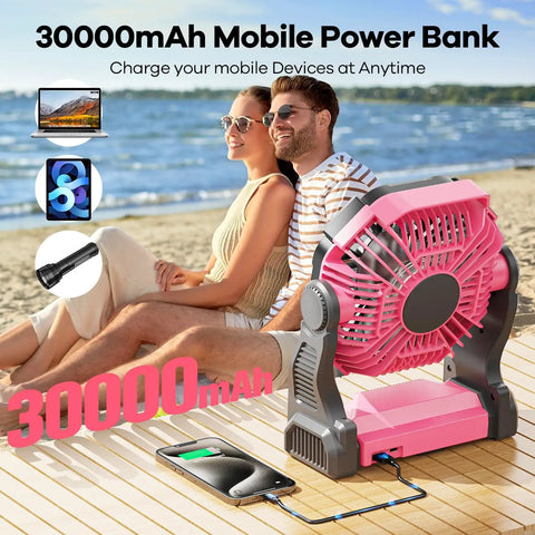Ultra Portable 30000mAh Solar Fan With LED Lantern And 10W Solar Panel Battery Powered Camping Fan shown on beach with phone charging