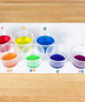 Plastic cups with colored water from True Color Fizzers Tub Tint Tablets Pack For Water Coloring One Tablet Colors Up To A Liter