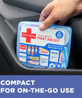 Front view of blue Band-Aid Travel Ready First Aid Kit, 80-piece compact plastic case with Johnson & Johnson branding