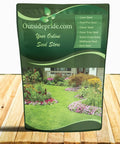 Green bag labeled 'Outsidepride.com Your Online Seed Store' on wooden surface, featuring a garden image with lawn and flowers.
