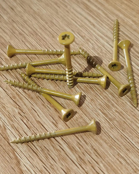 Heavy Duty Built To Last 5 Inch No 10 Exterior Wood Deck Screws Epoxy Coated For Pressure Treated Lumber And Timber Framing scattered on wood