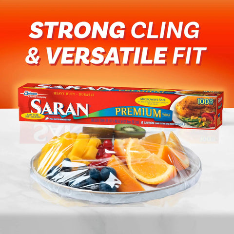 Ridiculously Handy Clear Plastic Wrap For Kitchen Storage in packaging next to plate with fruit, demonstrating tight cling