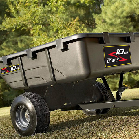 10 Cu Ft Heavy Duty Tow Behind Poly Utility Cart Dump Trailer with magnetic hitch on grass, side view