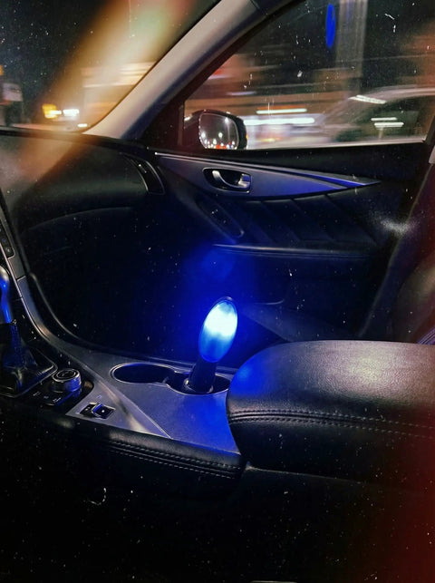 Ultimate Car Fuel Saver Device for cars and trucks, portable plug-in gas economizer illuminated in vehicle interior