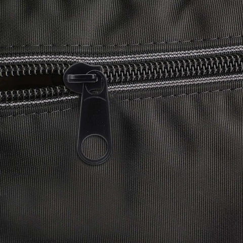 Close-up view of a zipper with a black plastic slider from the Zipper Puller Replacement Kit 32 Pieces In Four Sizes Quick Fix Zipper Slider Set For Coats Jackets