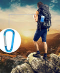 Hiker with backpack using Must Have 4 Pack Cooling Towels 40x12 Inches Microfiber Ice Towels for camping adventure