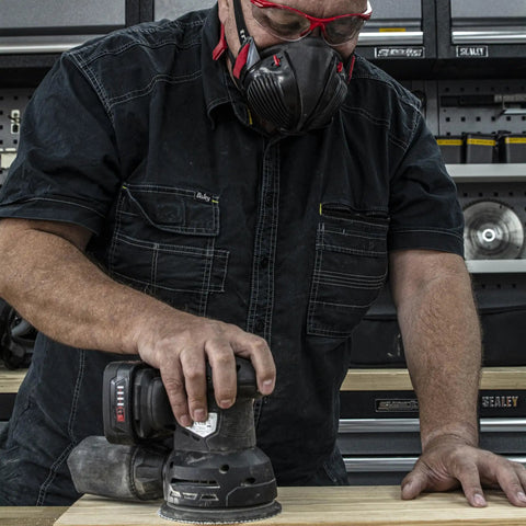Woodworker using Dust Mask With Replaceable Twin HEPA Filters For Woodworking And Construction, Half Face Pro Grade Mask, Medium Large Fit