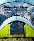 Interior view of 4 Person Easy Pop Up Tent With Automatic Setup No Fuss Waterproof Family Camping Tent With Skylight And Removable Rainfly Two Doors 190T Polyester PU 3000 Coated For Rainy Days And Sunny Campouts overlooking snowy mountains.