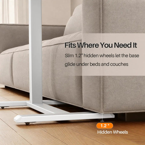 Total Game Changer Over Bed Table With Smooth Rolling Casters And No Sweat Pneumatic Height Adjustment Super Spacious Work Surface for easy gliding under couches with 1.2" hidden wheels.