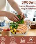 Person using Gigantic 17 Cup Glass Food Storage With Lids Leakproof BPA Free Mega Meal Prep Container for Roasting Turkey, 132 Oz, 3900 ml.