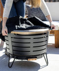 Tabletop Fire Pit Cover For Patio Pits 25.6 Inch Durable Stainless Steel Lid on black fire pit with cover being placed