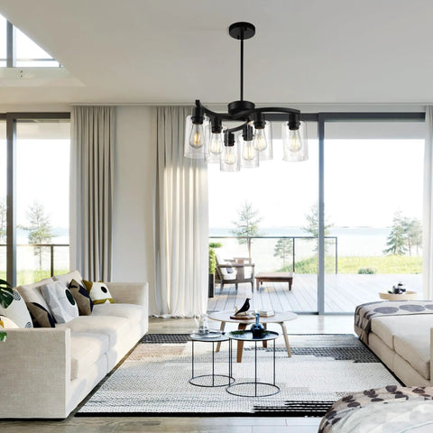 6 Light Modern Farmhouse Black Chandelier For Dining Room installed, showcasing elegant clear glass shades in living room setting