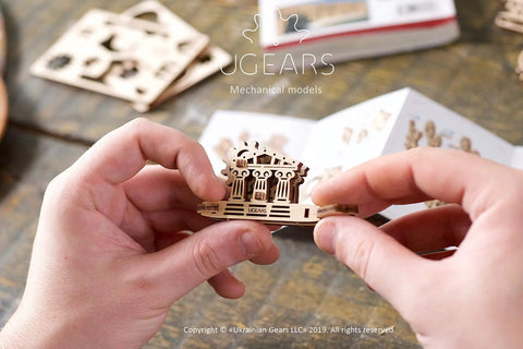 Wooden Fidget Creations Set Four Mini Mechanical Puzzles You Build Without Glue Or Tools, Stress Relief Toys For Adults And Kids, Portable Handcrafted Wood No Glue Needed Great For Focus And Calm. Parthenon puzzle held in hands