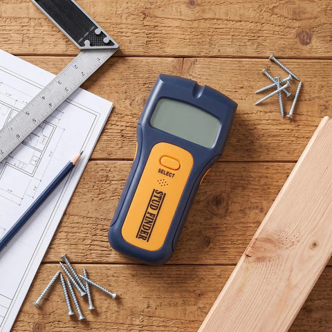 FTVOGUE Stud Finder Wall Scanner, with Smart Chip LCD Display on wooden surface with screws, ruler, and blueprint.