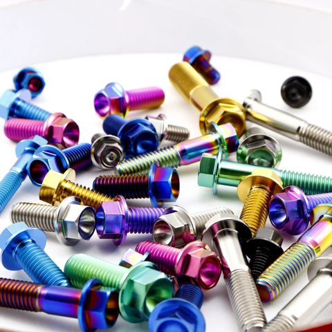 Titanium hex flange bolts with multicolor anodized finishes, close-up view.