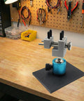 Killer Mini Vise Tabletop Clamp With 360 Degree Rotating Spherical Base And Sick Grip for model building on a wooden workbench.
