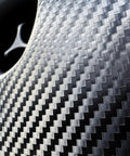 Close-up of Custom Carbon Fiber Charge Port Wrap Fits Tesla Model 3 And Model Y Vehicles 2018 Through 2024 Scratch Shield Skin.