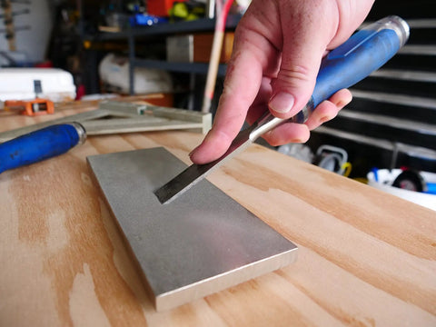 8 Inch Diamond Dia Sharp Whetstone Bench Stone With Medium Extra Fine Grit Sharpener, used with a chisel on a workbench.
