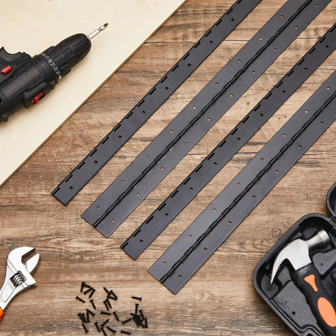 Four Pack 30 Inch Heavy Duty Piano Hinge Tough As Nails Continuous Hinges In Matte Black 304 Stainless Steel on wood surface with tools.