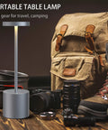 Cordless Table Lamp With 5000mAh Battery Rechargeable LED Light For Home And Outdoor Use, next to camping gear