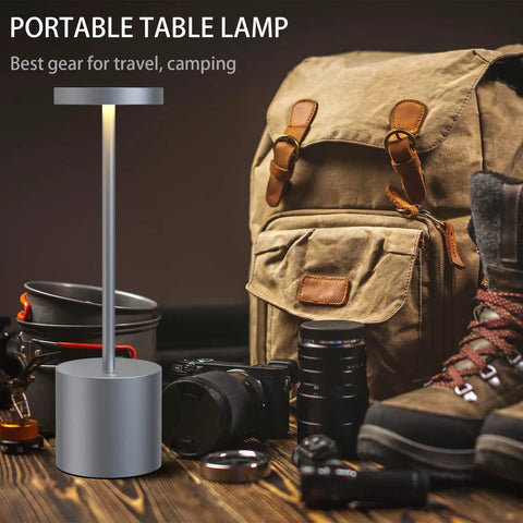 Cordless Table Lamp With 5000mAh Battery Rechargeable LED Light For Home And Outdoor Use, next to camping gear