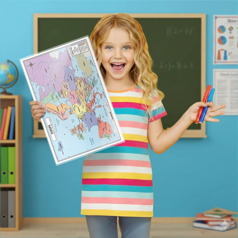 Child holding Europe Map 11x17 Laminated Dry Erase Chart, Double-Sided With Color Front And Blank Outline Back in classroom.