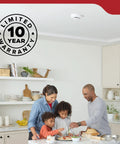 Top Shelf Smoke Detector Alarm With Crisp Voice Alerts And Loud Siren installed in a modern kitchen with family cooking.