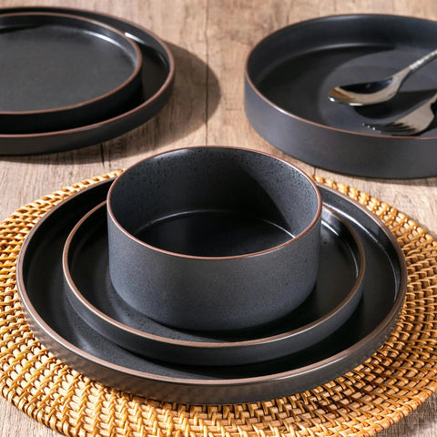 Top Tier Real Deal 12 Piece Stoneware Dinnerware Set With Sleek Matte Finish Includes Four Dinner Plates Salad Dishes And Cereal Bowls Lead Free on table.