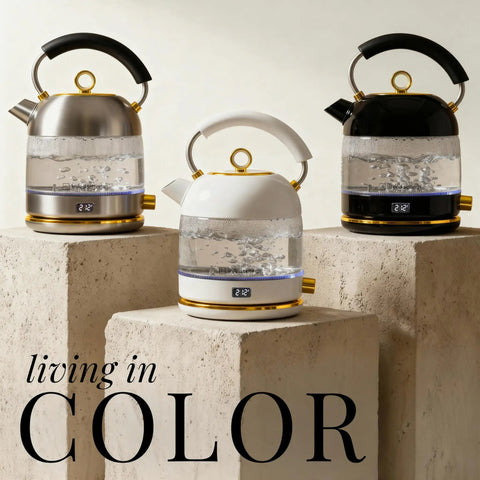 High Temperature Control Electric Kettle With 1500W Rapid Boil And Keep Warm Function Glass Body BPA Free Design White And Gold Finish Auto Shut Off Sleek Modern Design For Tea Lovers And Daily Hydration displayed on stone blocks with stainless steel and black variants.