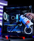Hand using Powerful Computer Duster and Cleaner for Electronics and Home Use, High Velocity Air Blower Removes Dust, Pet Hair, and Debris