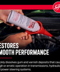 Trans Tune Transmission Treatment TT16 16 Oz Keeps Your Automatic Transmission Shifting Smooth being poured into engine